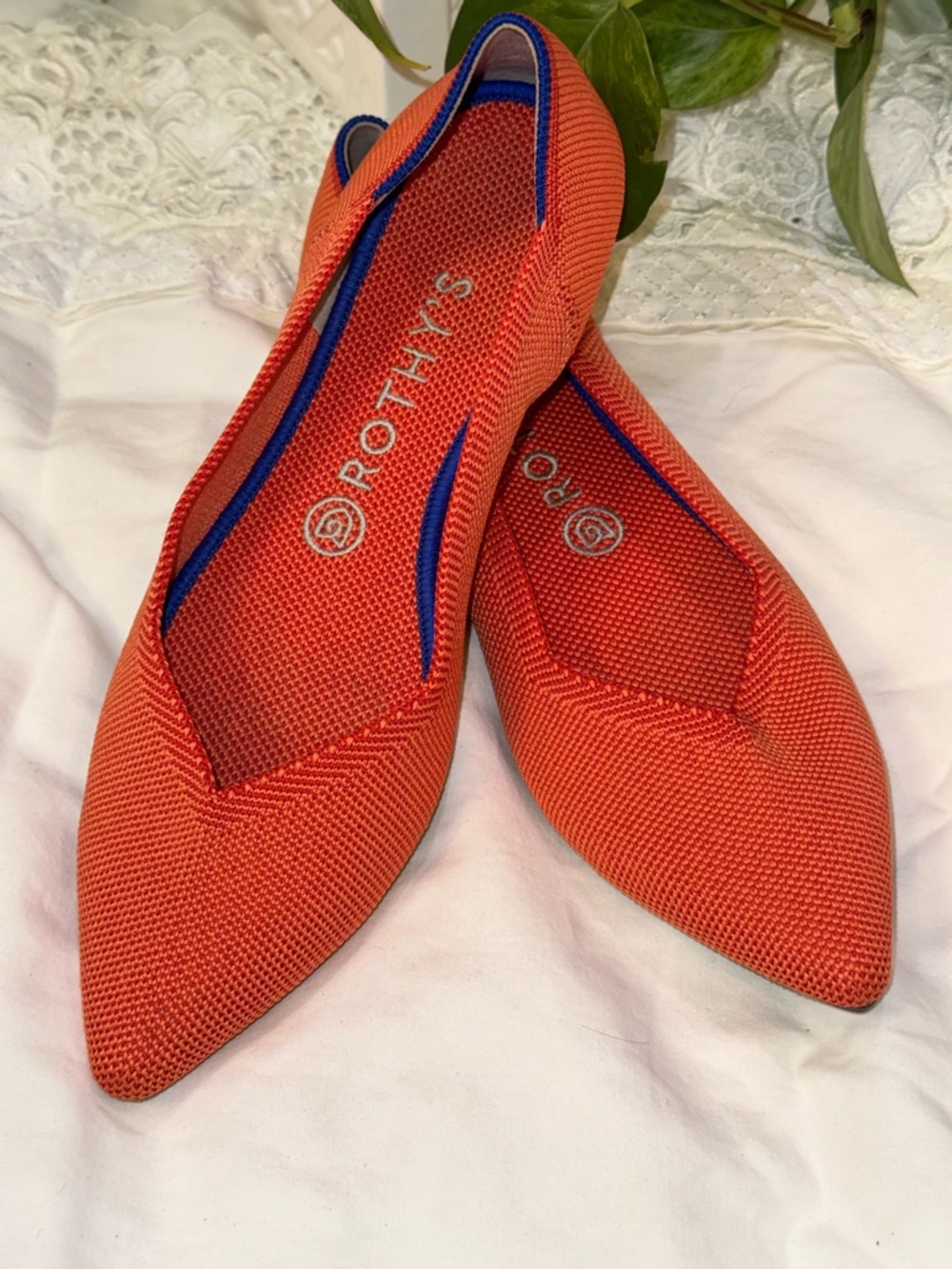 Rothy's Women's Pointed Knit Flats in Bright Orange with Blue Trim